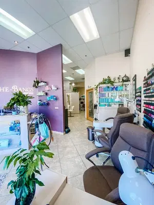 Che Bangs the Salon