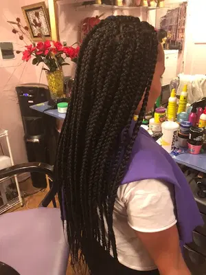 African Hair Braiding and Weaving Specialist ..Barber Available