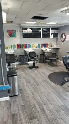 E Clips Hair Designs Inc